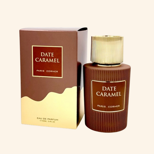 Perfume bottle and packaging labeled 'Date Caramel' on a light beige background.
