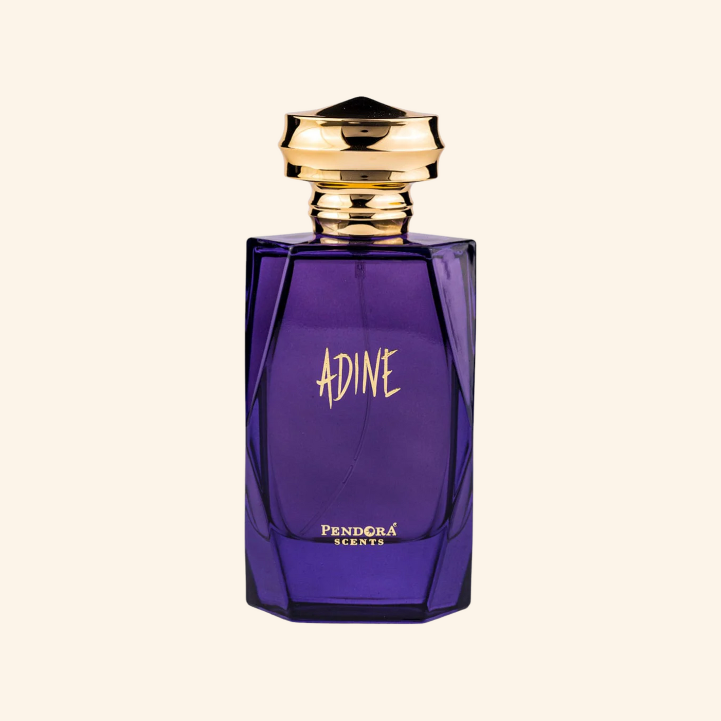 Purple perfume bottle with gold cap on a white background. Discover Pendora Scents by paris corner Adine . An iconic women's EDP with jasmine, cashmere wood & white amber. A stunning Alien alternative. Shop now nurabliss!