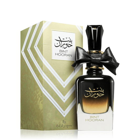 Discover Ard Al Zaafaran Bint Hooran. A rich women's fragrance featuring yuzu, blue lotus, and a warm tobacco-amber base. Sophisticated and deeply captivating.