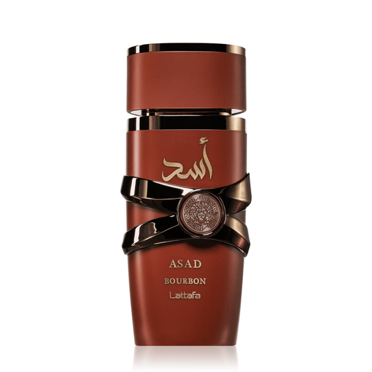 Discover Lattafa Asad Bourbon. A sophisticated men's fragrance featuring Mirabelle plum, cacao, and warm vanilla bourbon. Bold, smoky, and intensely masculine.