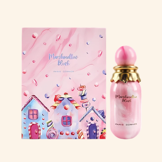 Pink 'Marshmallow Blush' perfume bottle and packaging with candy house design on a white background. Discover Paris Corner Marshmallow Blush UK. A sweet women's EDP with strawberry, raspberry, orange blossom & marshmallow. A stunning Oriana alternative. Shop now!