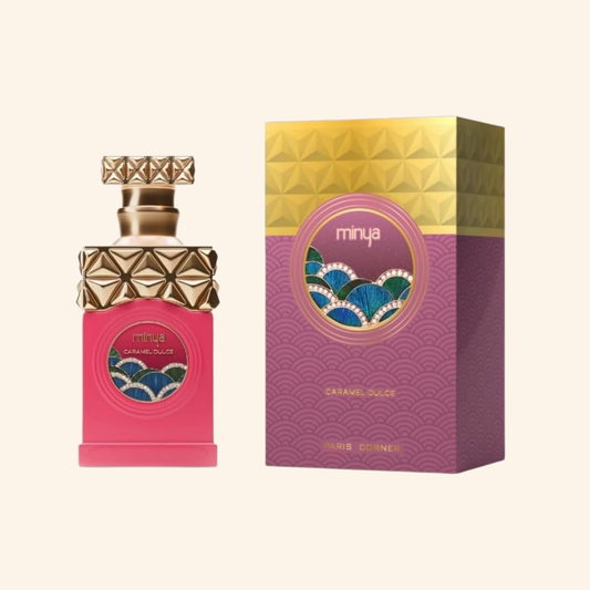 Perfume bottle and packaging with 'minya' branding on a white background.Discover Paris Corner Minya Caramel Dulce UK. A fun, decadent gourmand EDP with popcorn, butter, chestnut, chocolate & caramel. The ultimate cosy treat. Shop now!